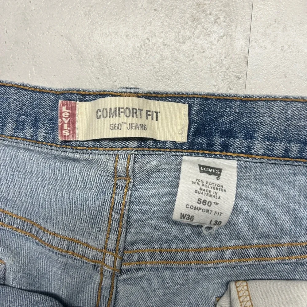Levis 560 Comfort Fit Jeans Light Wash Mens W36 L30 Distressed Baggy Denim 0752
